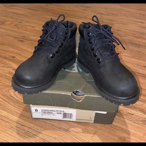 Timberland, Black, suede boot. Size 8c in good condition, box provided.